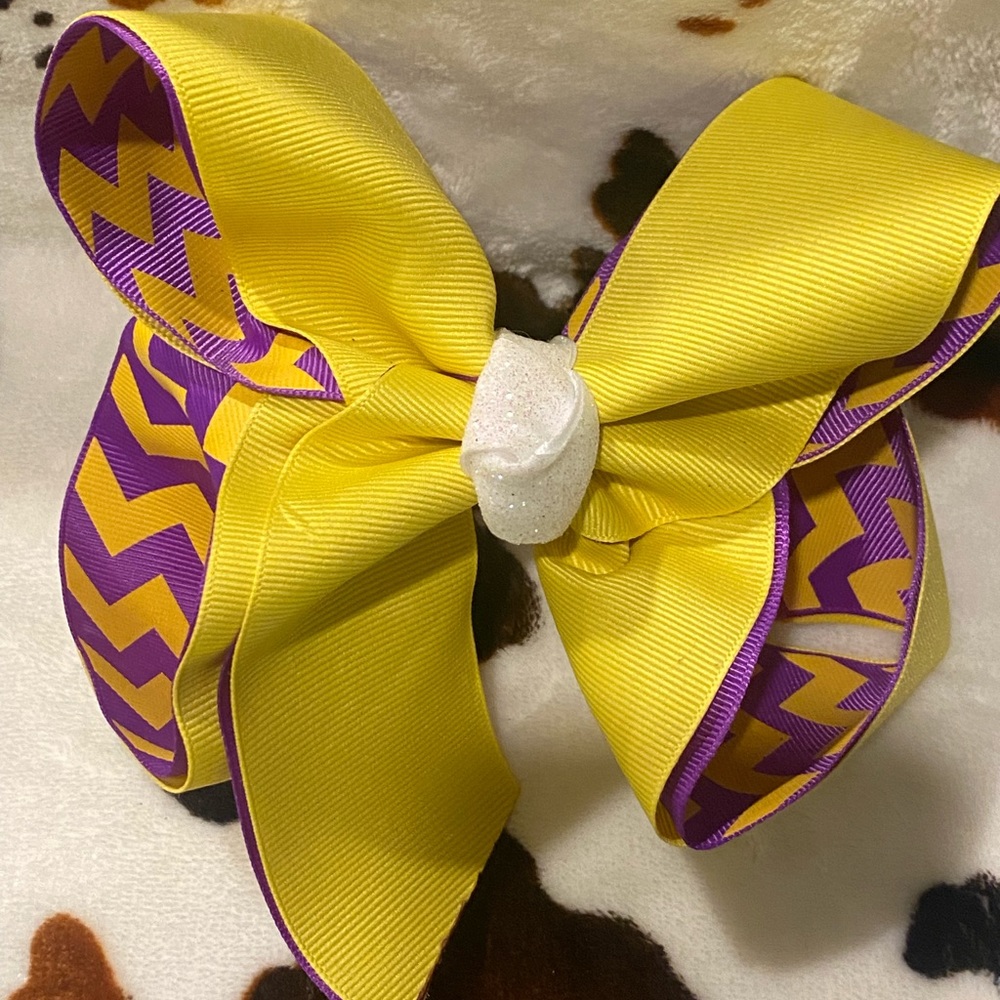 Yellow with glitter white knot.